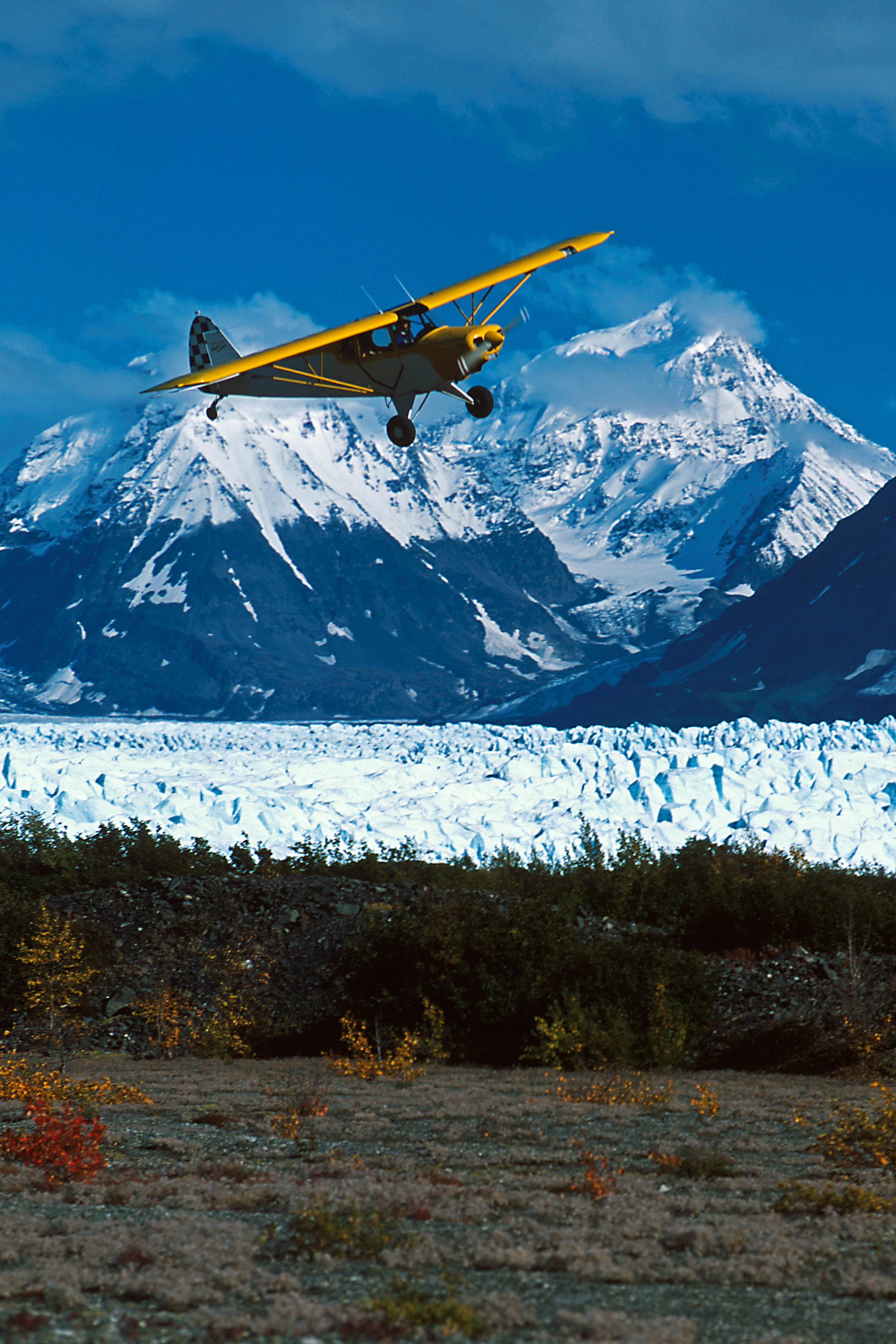 Alaska bush plane landing at Knik Glacier Picknick Table Strip, Alaska, Knik Glacier, near Palmer